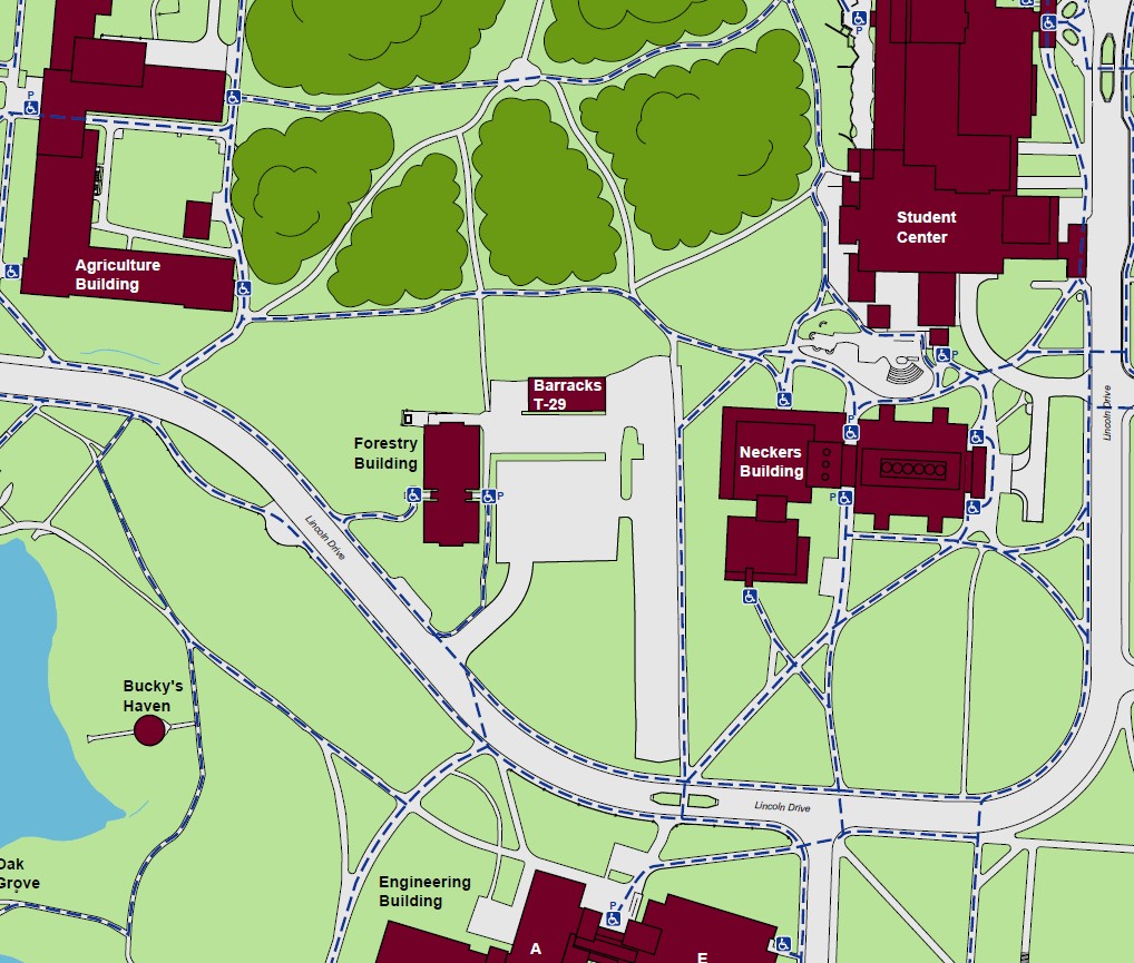 Displaying accessible pathways to the Paul Simon Public Policy Institute. A standard accessible entrance is located on the west side of the building, with a powered accessible entrance located on the east side of the building. 