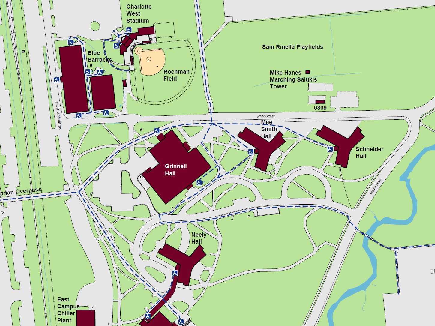 Displaying accessible pathways and entrances to Grinnell Hall. A standard accessible entrance is located at the north end of the building, while a powered accessible entrance is indicated at the southeast end of the building. 