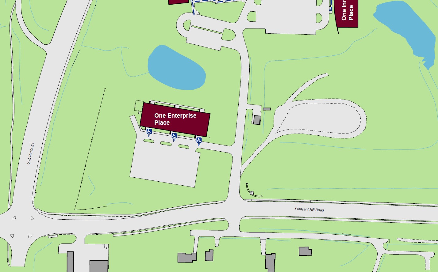Displaying three standard accessible entrances to One Enterprise Place at the south ends of the building.