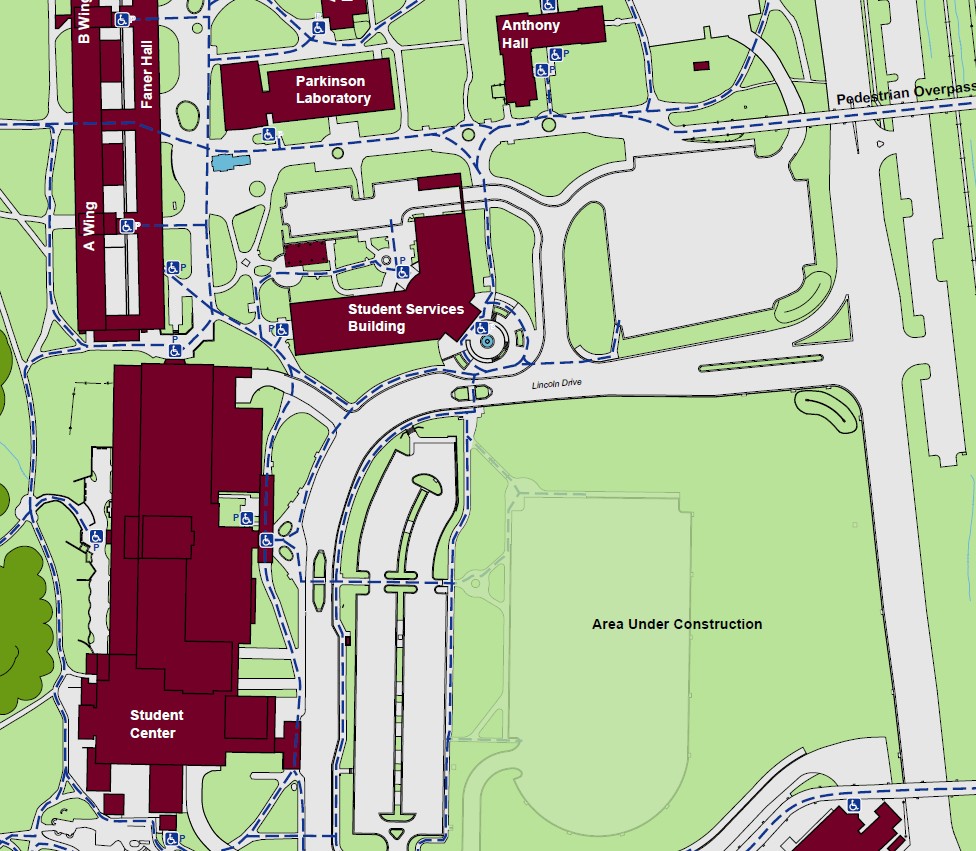 Displaying accessible pathways to the Student Services building with powered accessible entrances indicated on the west and northwest ends of the building. A standard accessible entrance is indicated on the southeast end of the building.