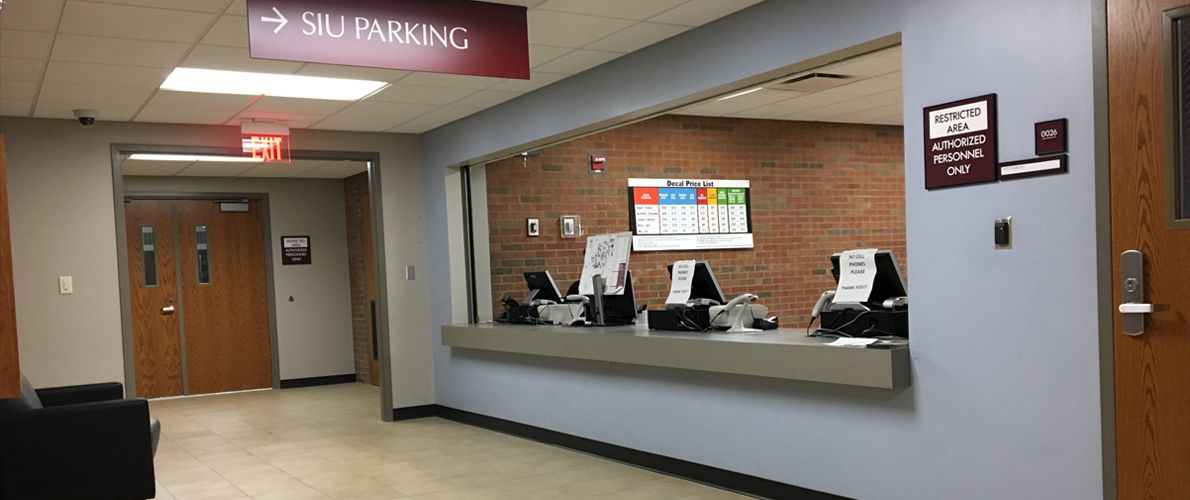 Inside Trueblood hall at SIU Parking desk