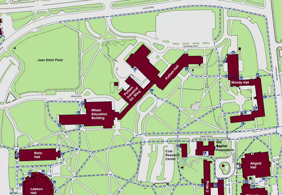 Displaying accessible pathways to Pulliam Hall. Powered accessible entrances located along the south drive loop shared with the Industrial Education Wing, with another located north on the back end of the building. A standard accessible entrance is indicated on the east side of the building as well.